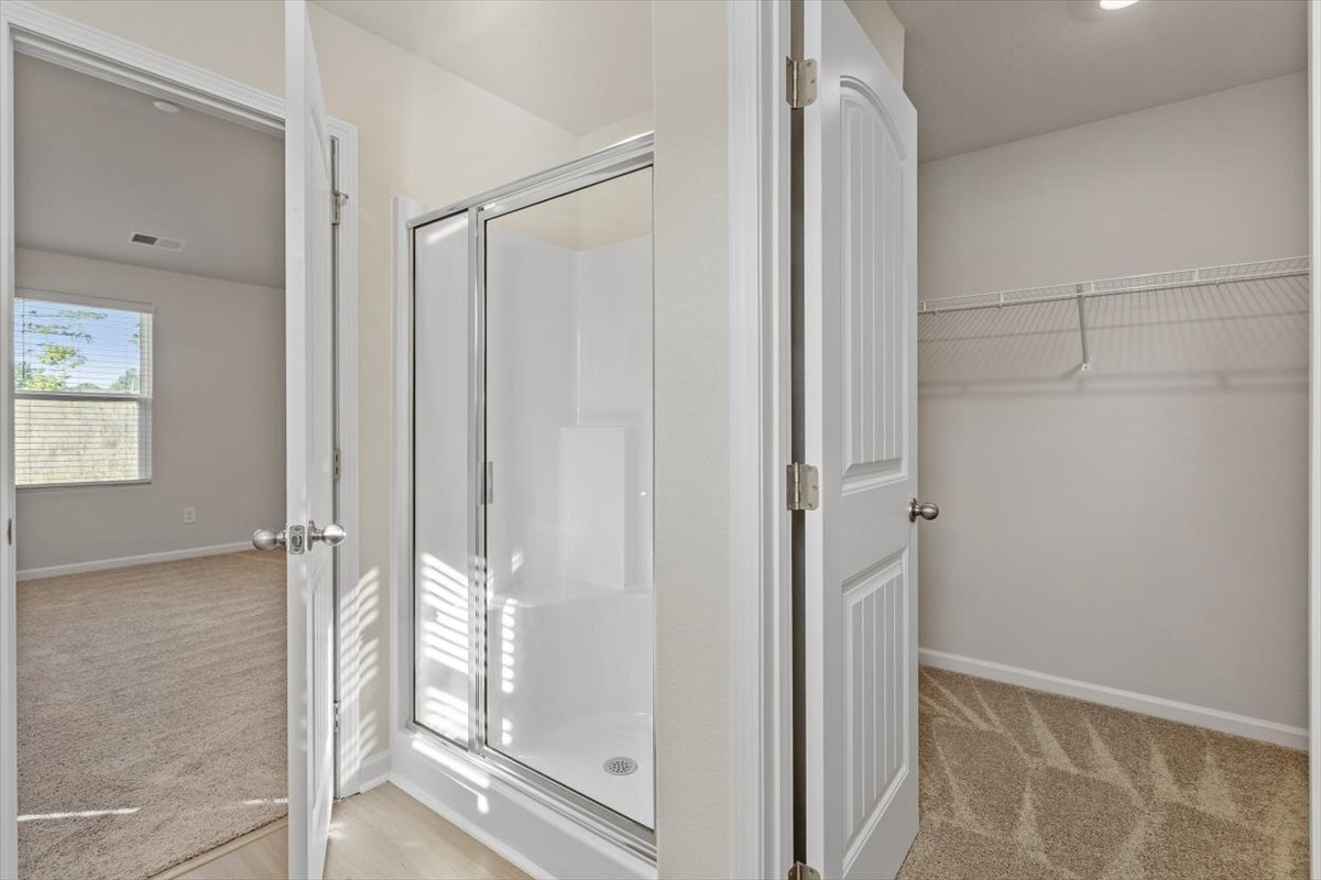 Primary Bath with Sep. Shower
& WIC